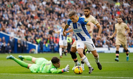 Brighton’s Leandro Trossard goes around Chelsea keeper Kepa Arrizabalaga before scoring their first goal.