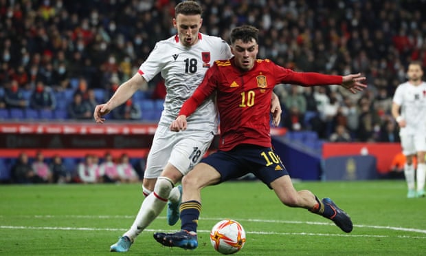 Pedri holds off Ardian Ismajili of Albania during Spain’s friendly at the RCDE Stadium in Barcelona on 26 March