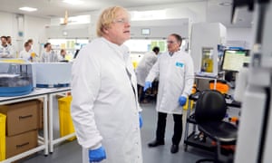 Prime minister Boris Johnson wearing PPE during his visit to the UK Biocentre in Milton Keynes, a Lighthouse Lab facility dedicated to the testing for COVID-19.