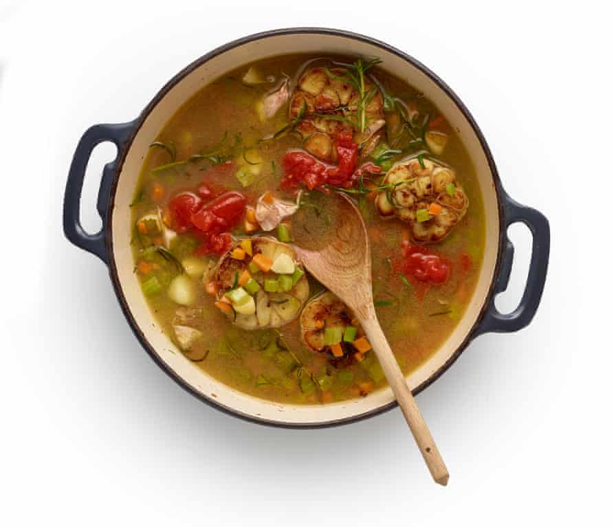 Felicity Cloake’s pollo alla cacciatore or hunter’s chicken masterclass for Feb 19 2022, stage 5: deglaze the pan, bubble away then add stock and tomatoes.