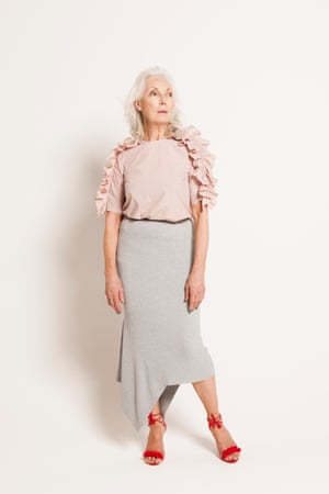 Pale pink top with ruffles on sleeves, Cos, grey asymmetric cut skirt, red high heeled sandals with ankle straps