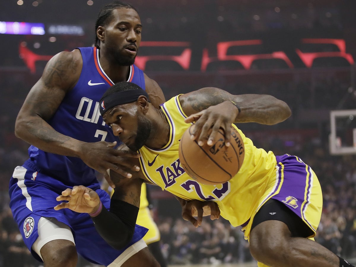 Kawhi Leonard leads Clippers to win over LeBron James's Lakers in battle of LA | NBA | The Guardian