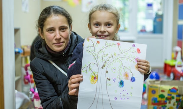 Olga Rebrova and her daughter at the Save the Children community centre in ­Avdiivka.