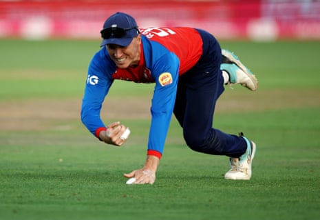 England's Tom Banton takes a catch to dismiss India's Harshit Rana off the bowling of England's Josh Tongue.