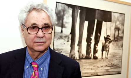 Elliott Erwitt in front of his photograph DogDog at an exhibition in Düsseldorf, Germany, in 2005.