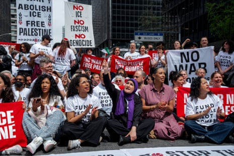 Activists blocking a roadway during a protest
