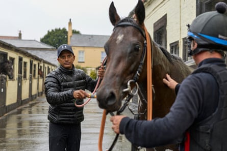 Gihan Arnolda with a horse at Newmarket