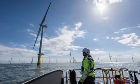 An engineer at a windfarm off the coast of the UK.