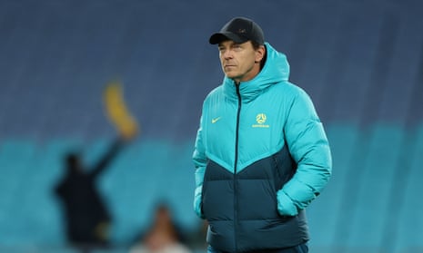Matildas coach Tony Gustavsson inspects the pitch before the warmup.