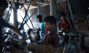 If child labour was wrong in the London of the 1820s, what makes it right in the Dhaka of the 2010s? Above, children working at an aluminium utensils factory in Dhaka, Bangladesh.