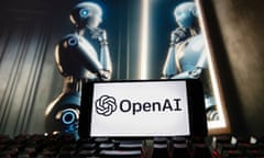 The OpenAI logo on a cell phone with an image on a computer monitor generated by ChatGPT's Dall-E text-to-image model