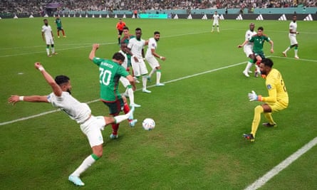 Henry Martín (No 20) scores Mexico’s first goal but it was not enough to take them into the last 16.