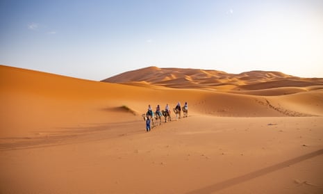 A camel ride in the Moroccan Sahara.