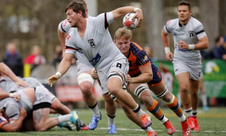 New York’s Hanco Germishuys tries to bring down Rugby ATL’s Jason Damm in a game in 2020.