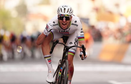 Tadej Pogacar celebrates winning the Milano-Sanremo one-day cycling race.