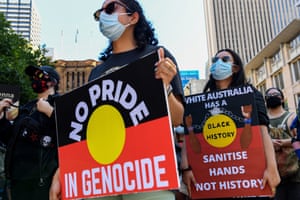 Protesters take to the streets during an Invasion Day rally, in Sydney. Thousands of protesters gathered in cities across Australia to demand Australia Day be abolished.