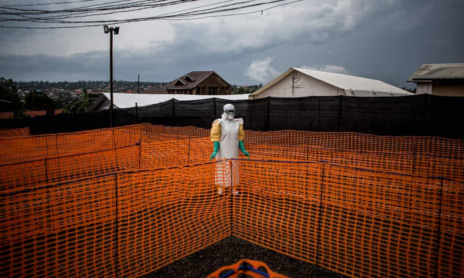 A health worker in Democratic Republic of Congo wears protective clothing during Ebola virus outbreak in 2018. 