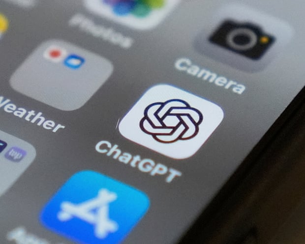 CClose-up of a smartphone screen showing the ChatGPT app icon among other apps.