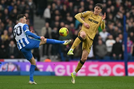Pascal Gross clears the ball from Palace new boy Jorgen Strand Larsen.