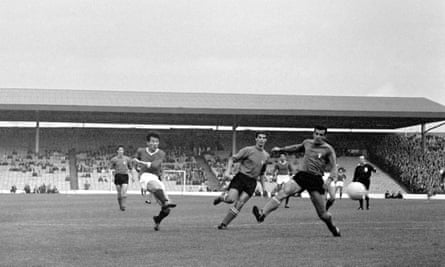 Pak Doo-ik (left) scores North Korea's winning goal in their 1966 match against Italy .
