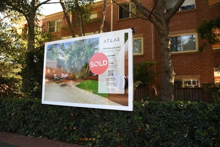A sold sign in front of a Sydney apartment.