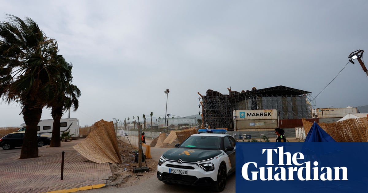 One dead and dozens hurt as stage collapses in high winds at Spanish festival - The Guardian