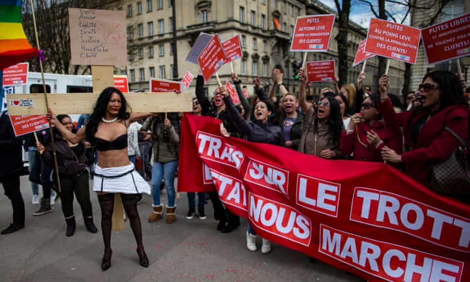 Transgender sex workers protest in Parios against a parliamentary vote on legislation making it illegal to pay for sex
