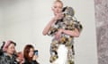 Maggie Maurer with robot baby at Schiaparelli's Paris show in January