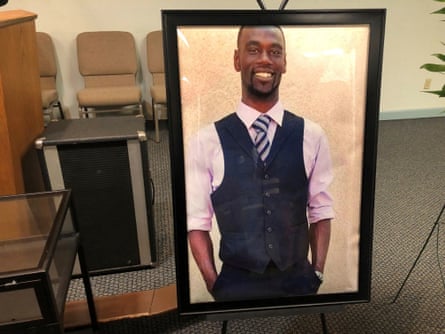a portrait of a man in black frame
