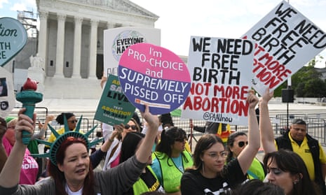 Protesters in favor and opposed to abortion gather outside the supreme court in Washington DC.
