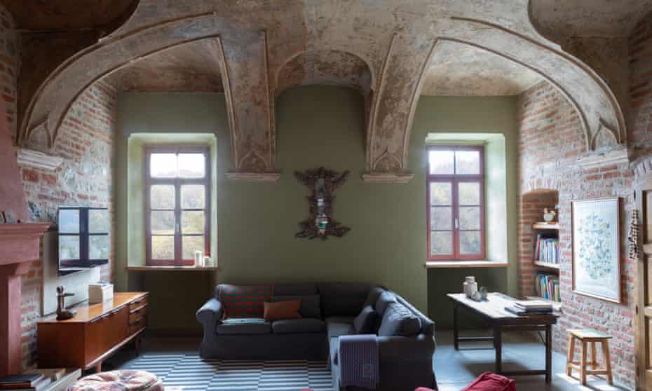 The exposed 400 year old walls of the farmhouse in the sitting room
