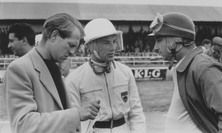Peter Collins, left, Stirling Moss, centre, and Argentina’s Juan Manuel Fangio at the British Grand Prix at Silverstone in July 1956.
