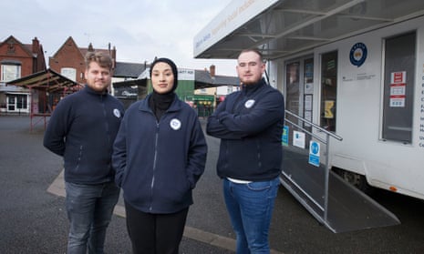 Citizens Advice employees (from left) Dominic, Hajira and Dan at an outreach mobile unit in Wednesbury, West Midlands.