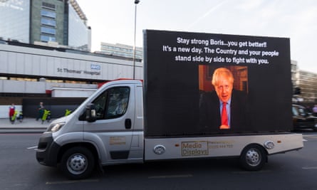 A billboard van wishing Boris Johnson well drives past St Thomas’ hospital in London.