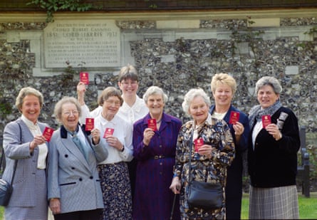 Some of the first honorary female MCC members – including Carole Cornthwaite (fourth from left) – holding their membership cards in 1999.