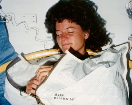 Nasa astronaut Sally Ride in her sleep restraint on the space shuttle Challenger, 1983.