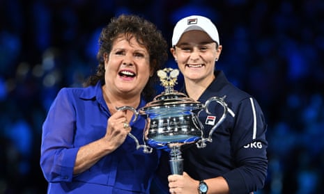 Ash Barty poses with Evonne Goolagong Cawley, four times an Australian Open singles champion, after receiving the trophy from her