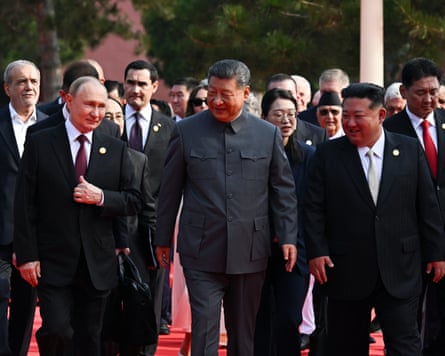 Military parade to mark 80th anniversary of the end of the Sino Japanese war in Beijingepa12347471 (L-R) Russian President Vladimir Putin, Chinese President Xi Jinping, North Korean leader Kim Jong Un and heads of foreign delegations arrive to attend a military parade marking the 80th anniversary of the end of the Second Sino-Japanese War, known in China as the War of Resistance against Japanese Aggression, and the end of World War II, at Tiananmen Square in Beijing, China, 03 September 2025. EPA/SERGEY BOBYLEV/SPUTNIK/KREMLIN POOL / POOL MANDATORY CREDIT