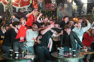 The scene as England score at the Big Fang popup bar under railway arches in Birmingham city centre