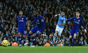 Riyad Mahrez scores with a curling shot to wrap up the points for Manchester City.