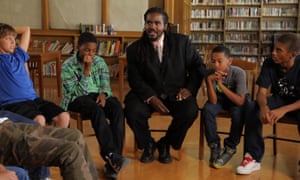 Life lessons: educator and youth advocate Ashanti Branch discusses feelings with a group of teenage boys.