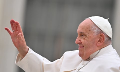 Pope Francis waves as he leaves at the end of the weekly general audience at Saint Peter's Square in The Vatican on October 16, 2024.