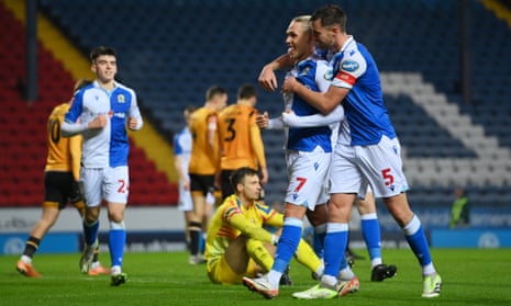 Arnor Sigurdsson of Blackburn Rovers celebrates with Dominic Hyam of Blackburn Rovers after scoring his team's fourth goal against Cambridge United.
