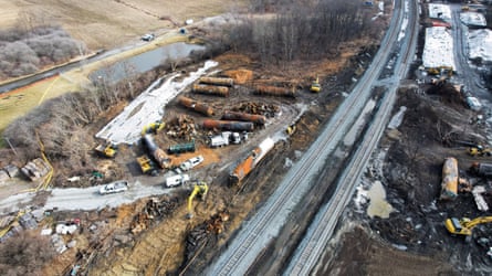 View of the site of the derailment of a train carrying hazardous waste in East Palestine, Ohio.
