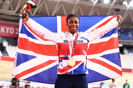 Kadeena Cox celebrates after collecting her gold medal