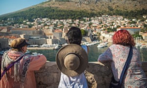 Guests admire the Dubrovnik coastline and harbour.