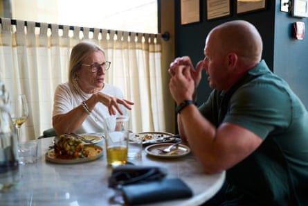 Steph and Stephen chat across a restaurant table