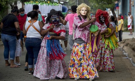 People take part in the feast day of of San Pascual Baylon in Chinandega, Nicaragua, on Sunday.