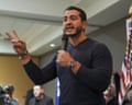a man speaks into a microphone