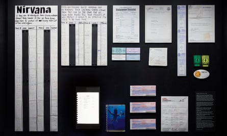 Black display board with documents, plane tickets and a petition